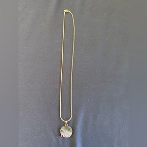 Sterling silver necklace with metallic and purple stones